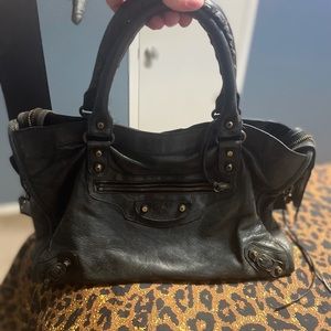 Balenciaga black motorcycle purse super cute.